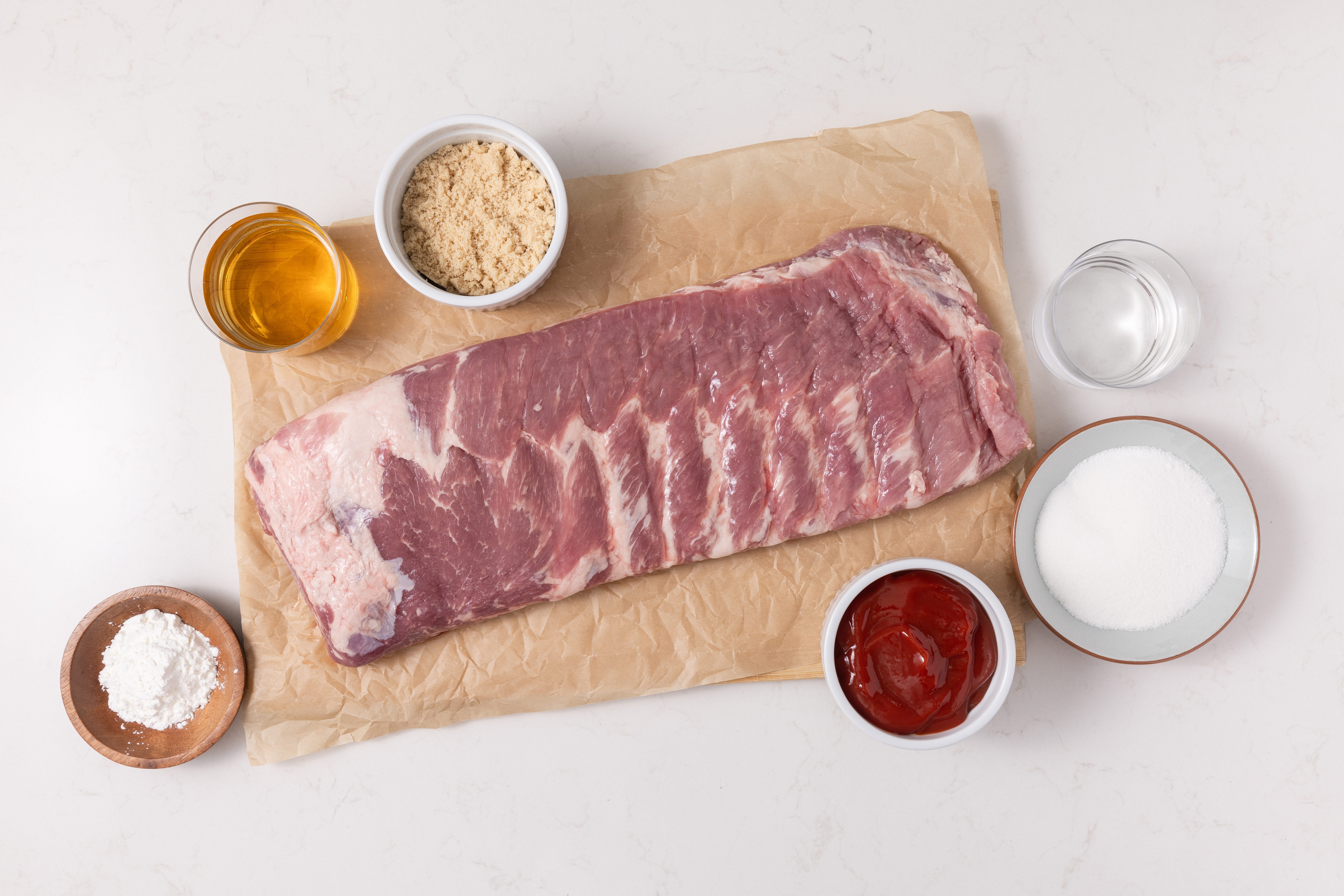 Ingredients for sweet and sour spareribs on kitchen counter.