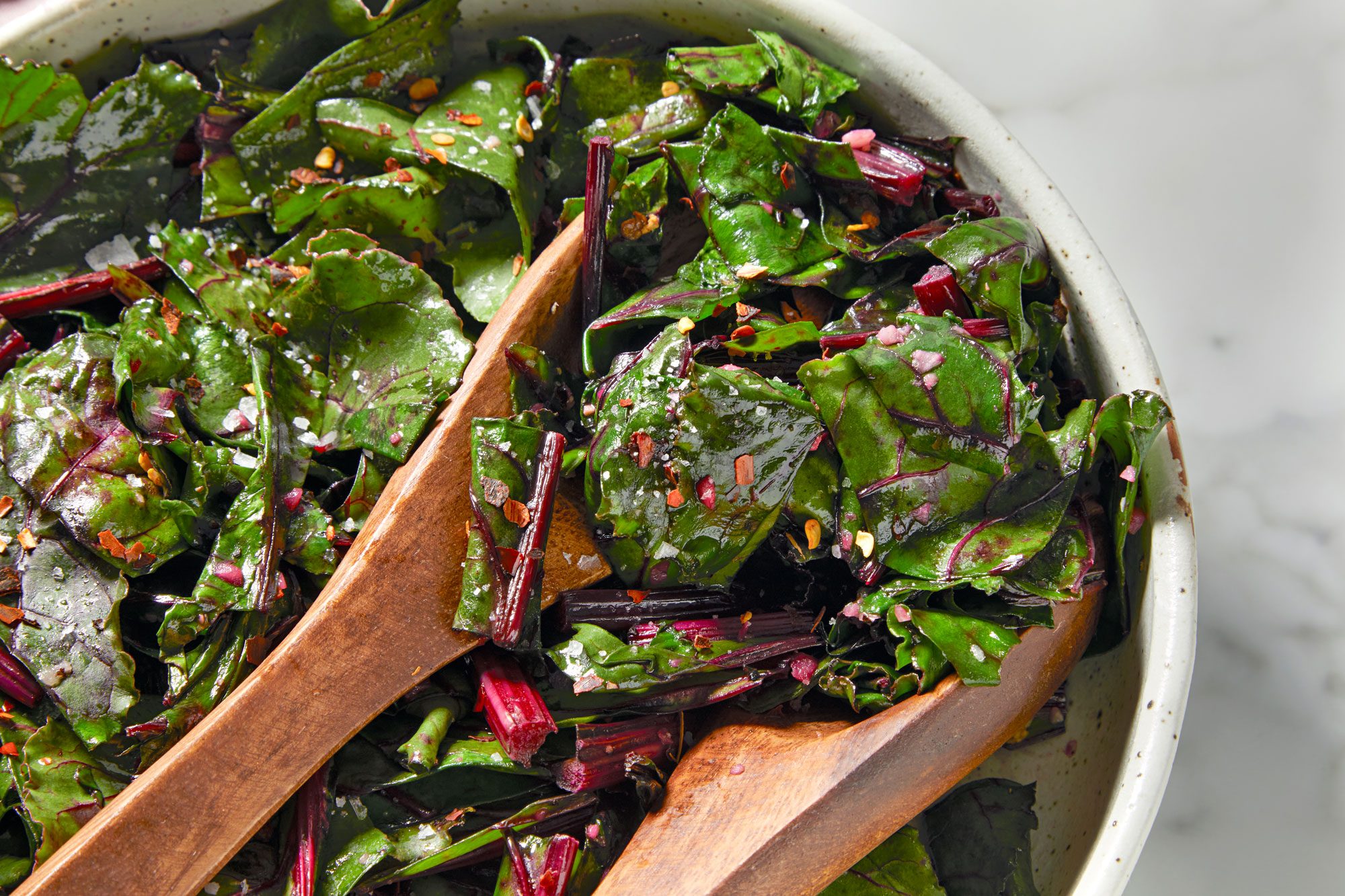 Beet Greens served in bowl with tong