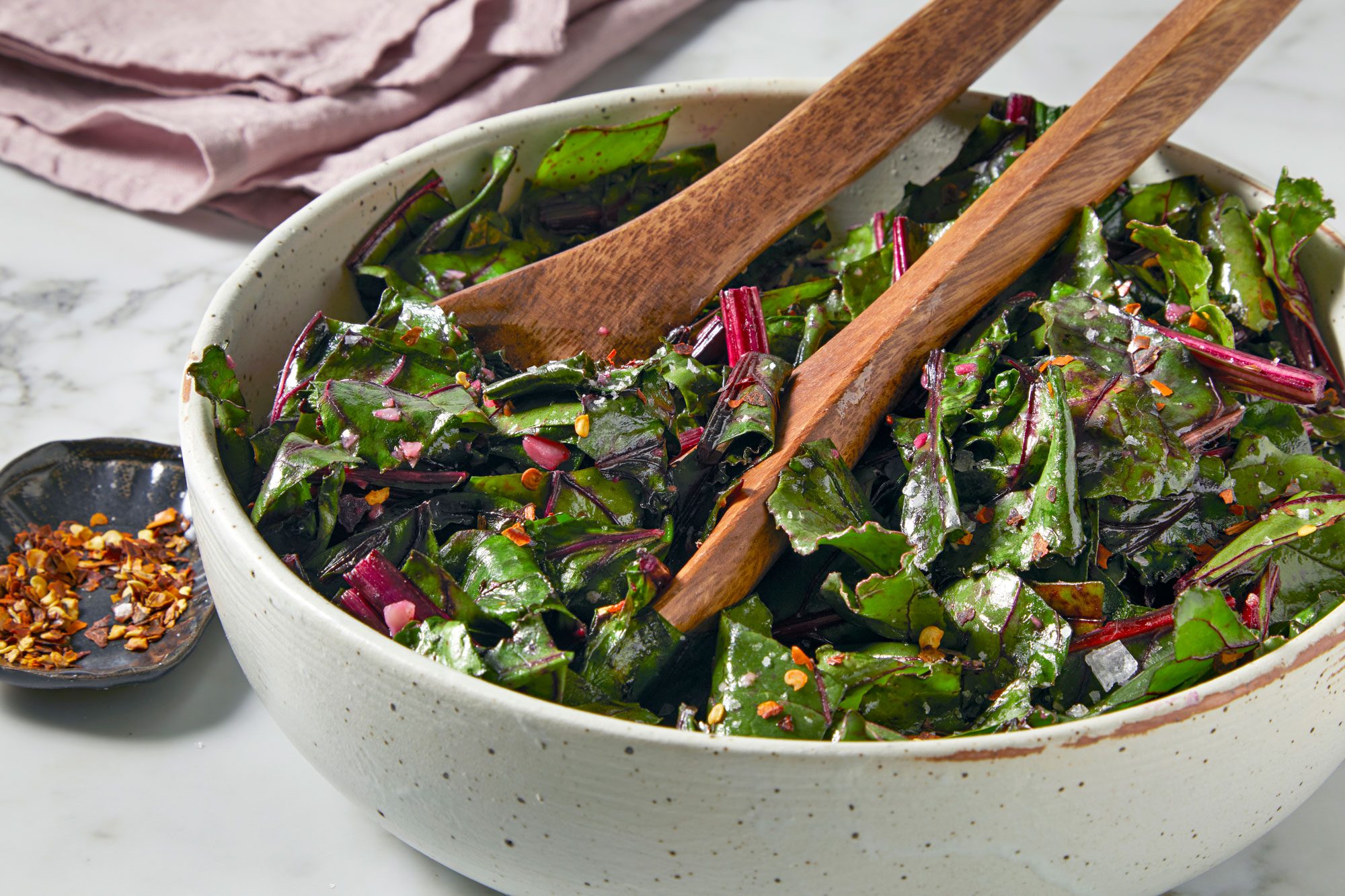 Beet Greens served in bowl with tong