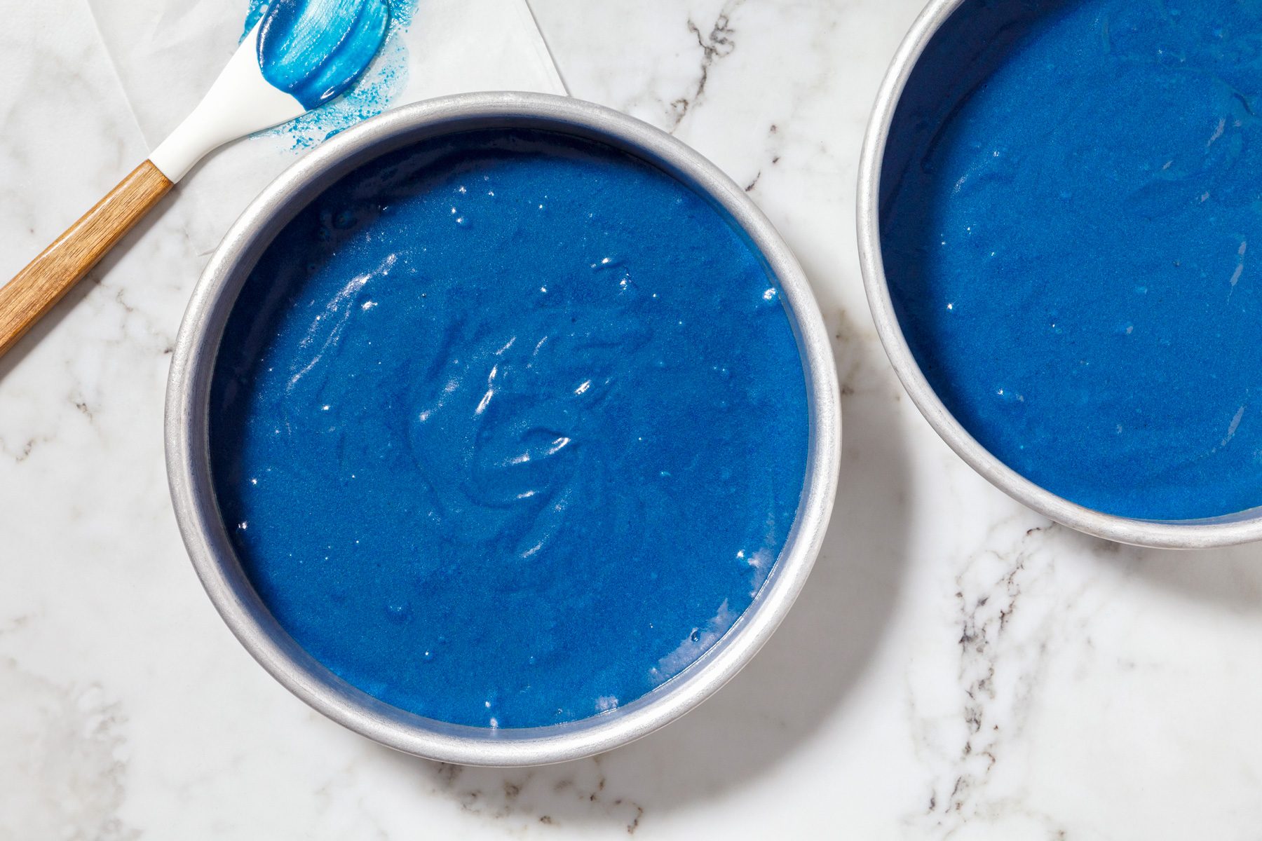 Transfer batter to 2 greased 8-in. round cake pans.