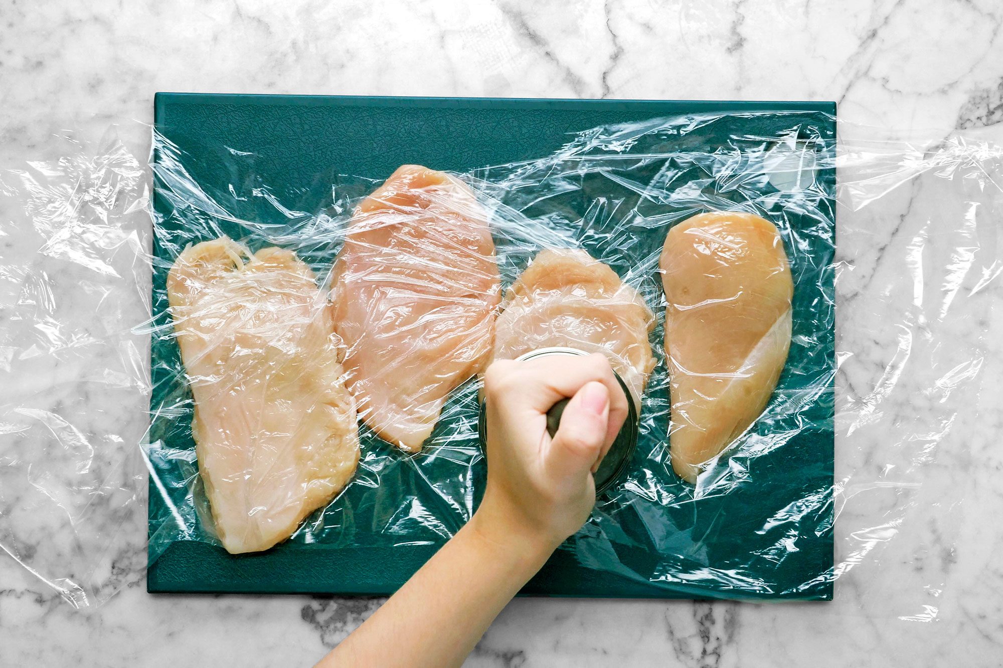 Pound chicken breasts with a meat mallet to 1/2-inch thickness