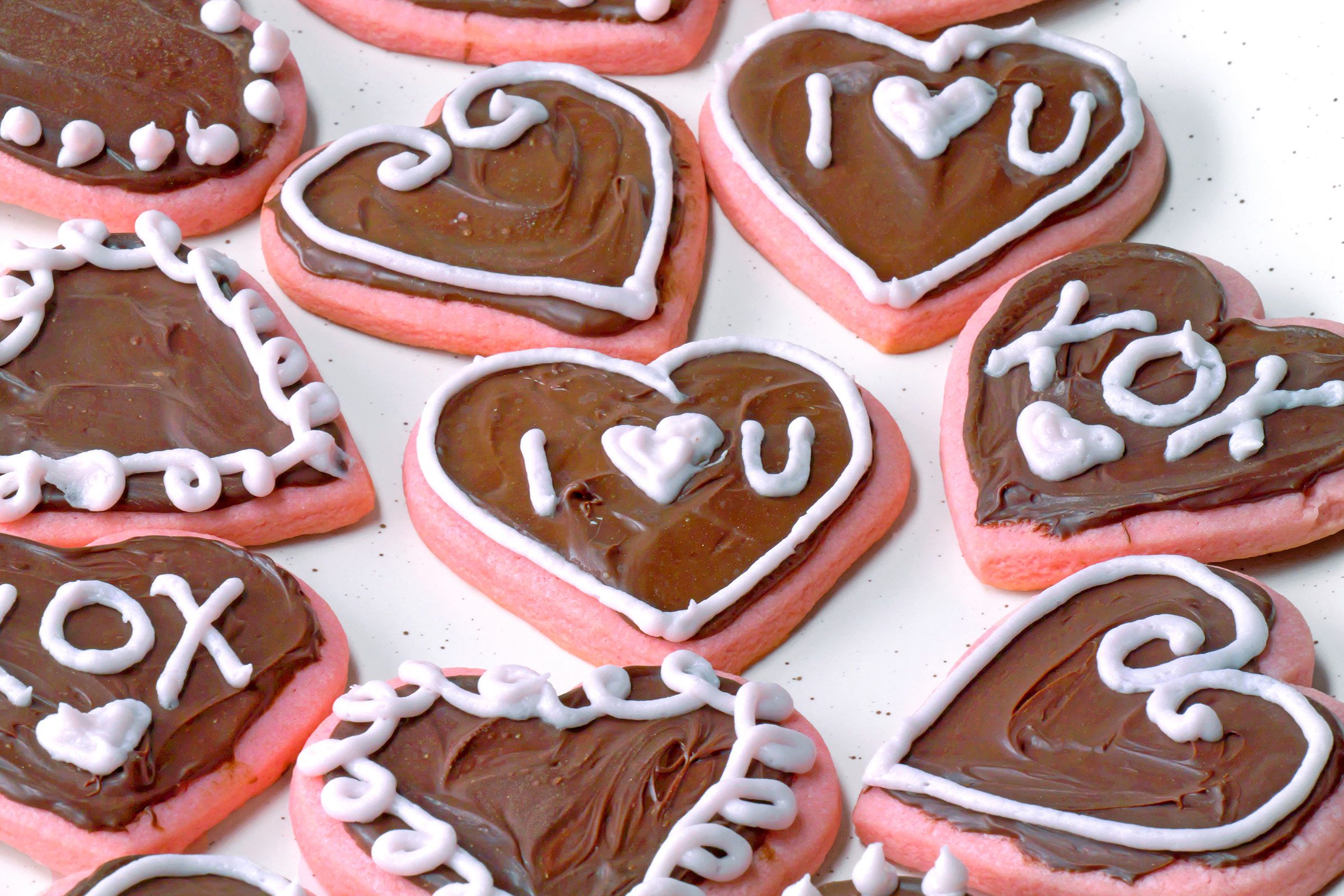 Valentines Cookies decorated with chocolate glaze and frosting