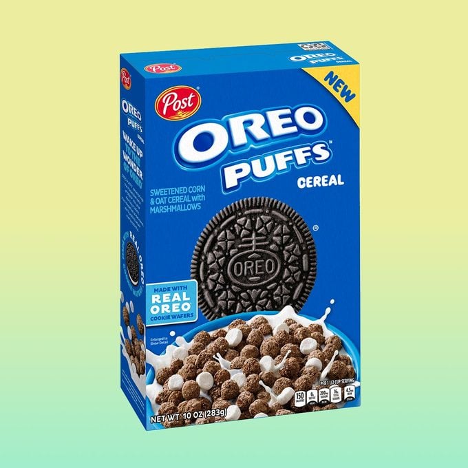 Box of Oreo Puffs cereal on a yellow and green background