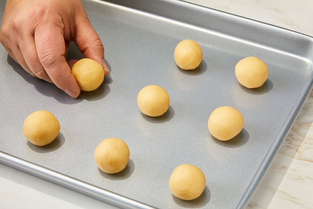 Shape dough into 1-in. balls. Place 2 in. apart on ungreased baking sheets.