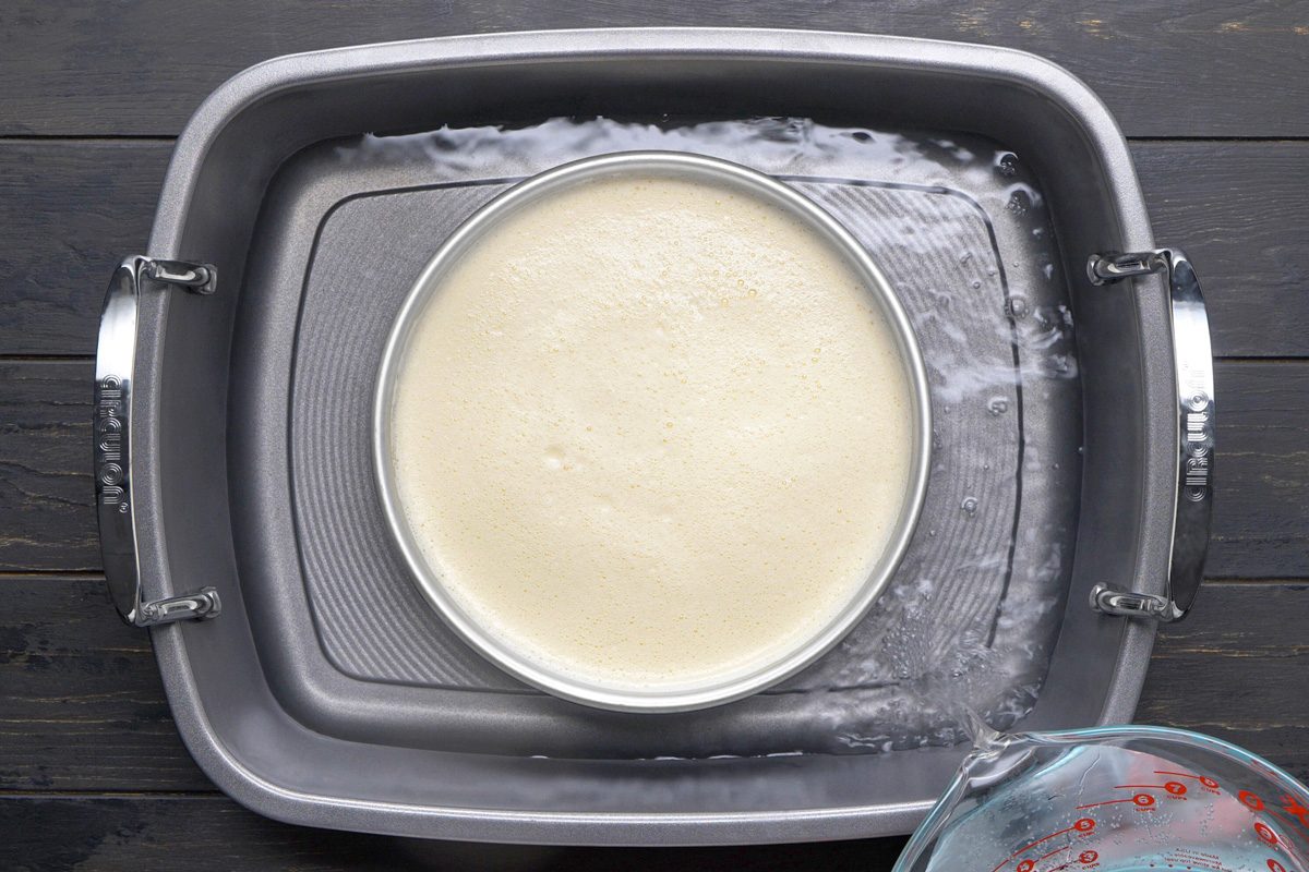 cake pan placed in roasting pan