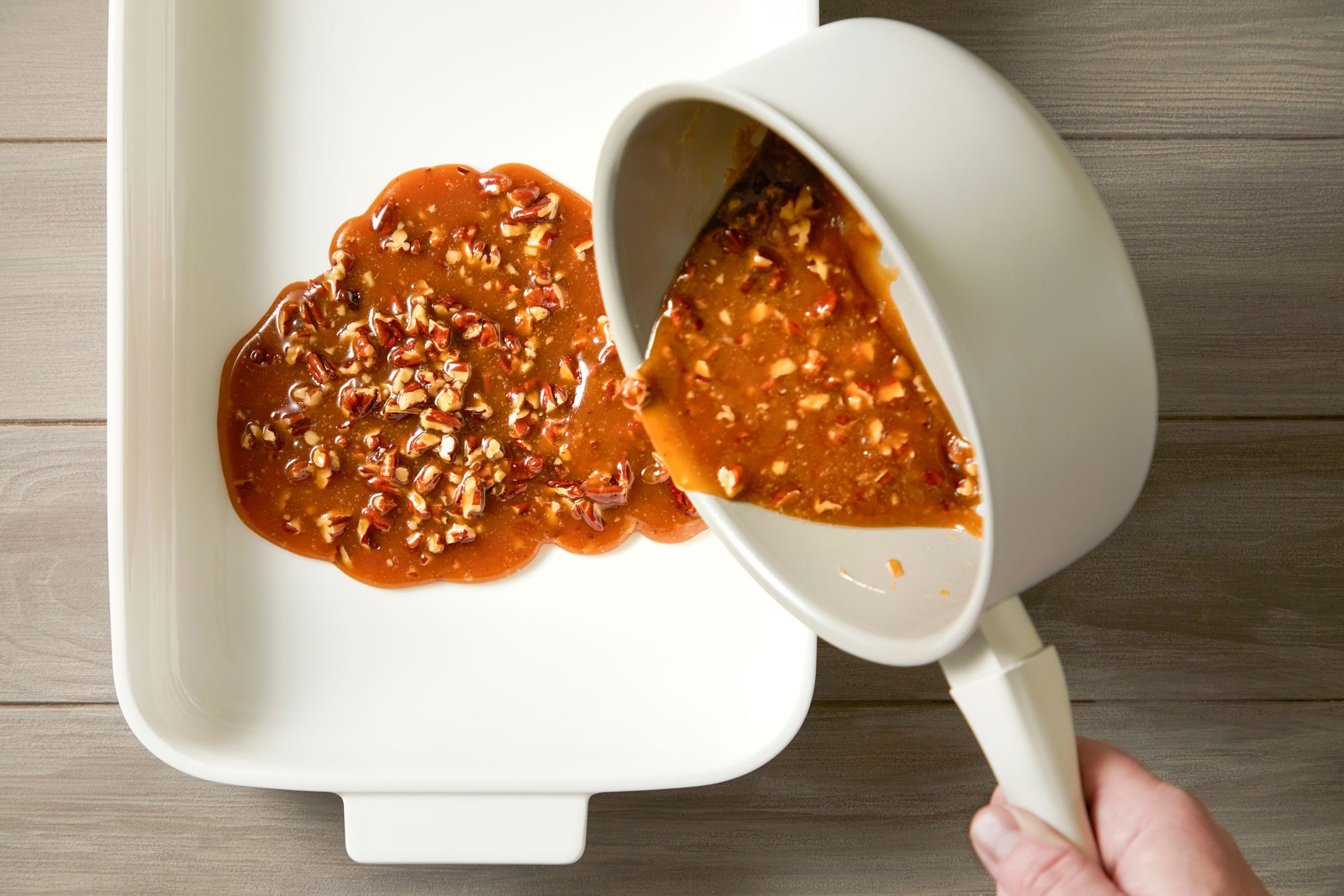 Make pecan sauce by combining brown sugar, butter and corn syrup