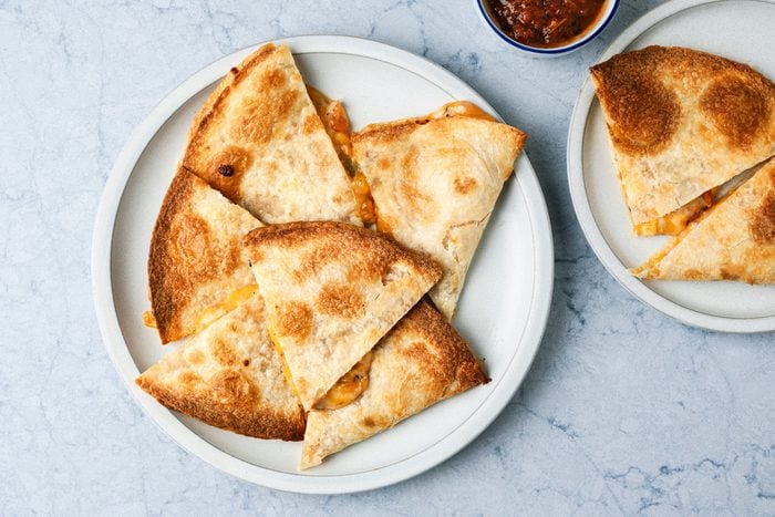 Air Fryer Quesadilla is ready and served in a plate