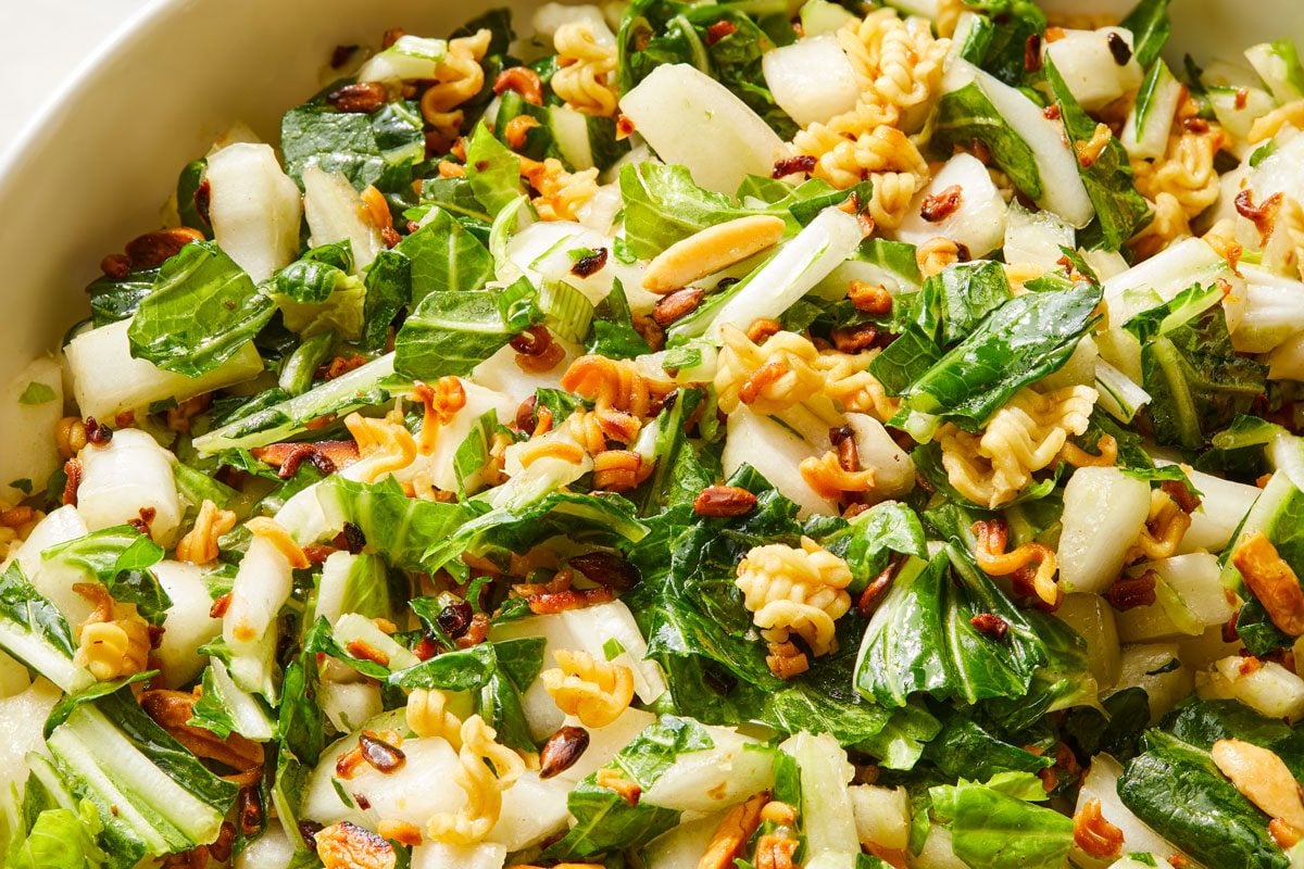 Close up shot of Bok Choy Salad; in a white bowl;