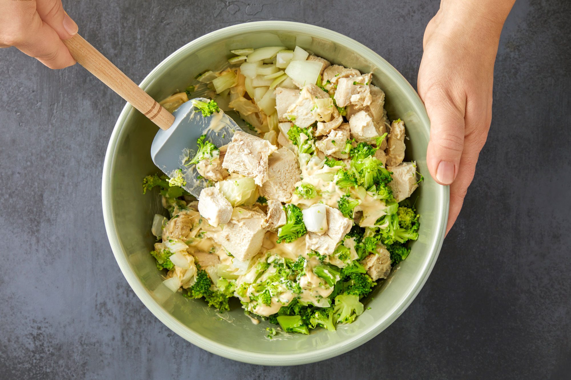 Stir in the chicken, broccoli and onion.