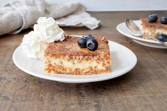 Grape Nuts Pudding served with whipped cream and grapes
