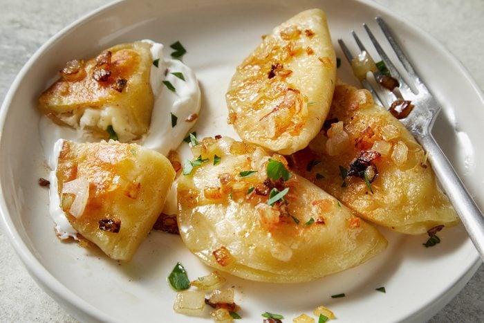 pierogis served on a plate
