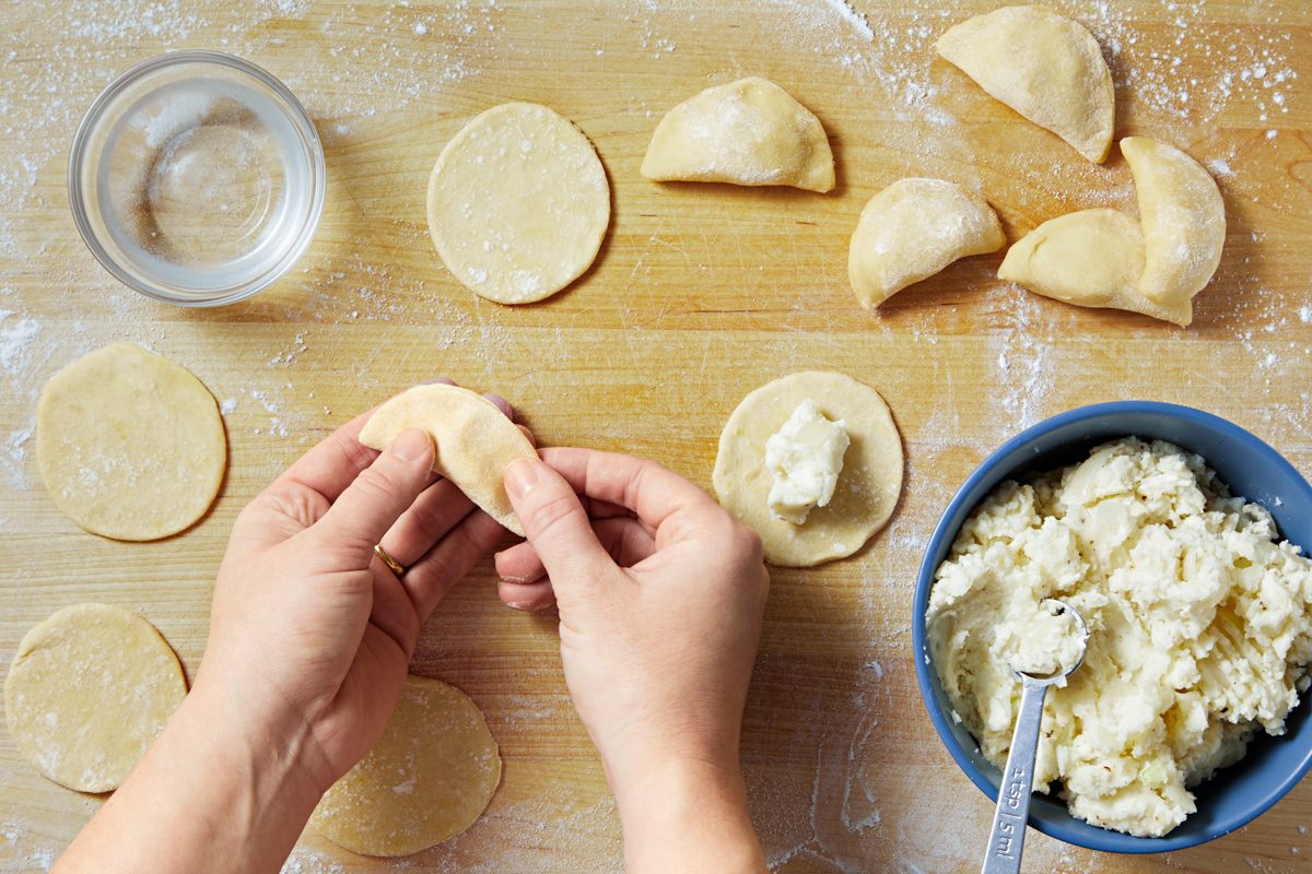 pierogi shells being made with dough