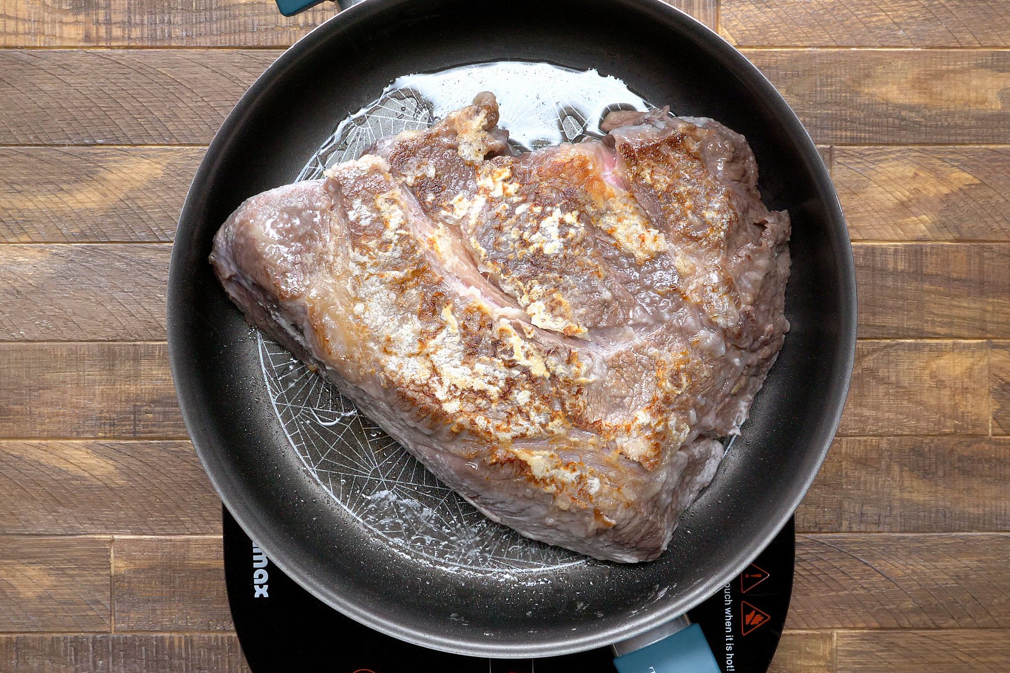 In a large skillet over medium-high heat, brown roast in oil on all sides.