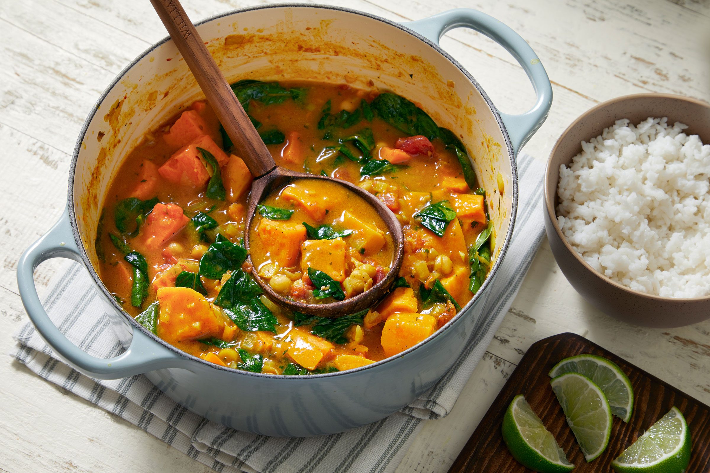 Sweet Potato Curry served with rice and lemon slices