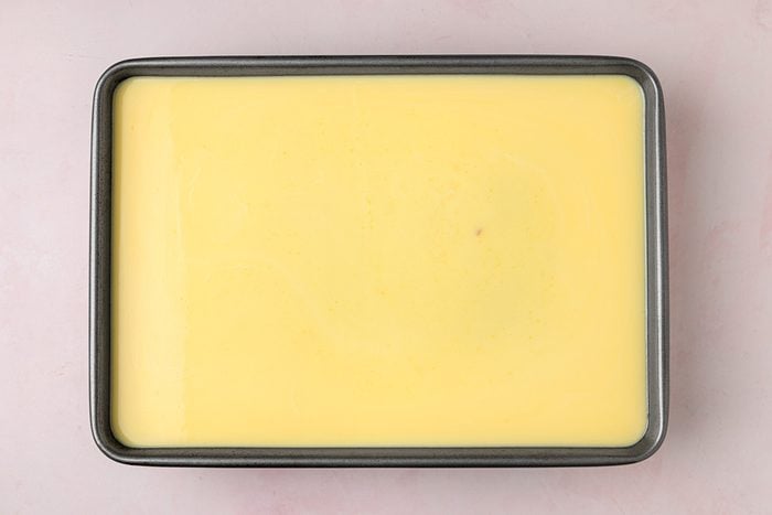 spread the cream mix over the cake