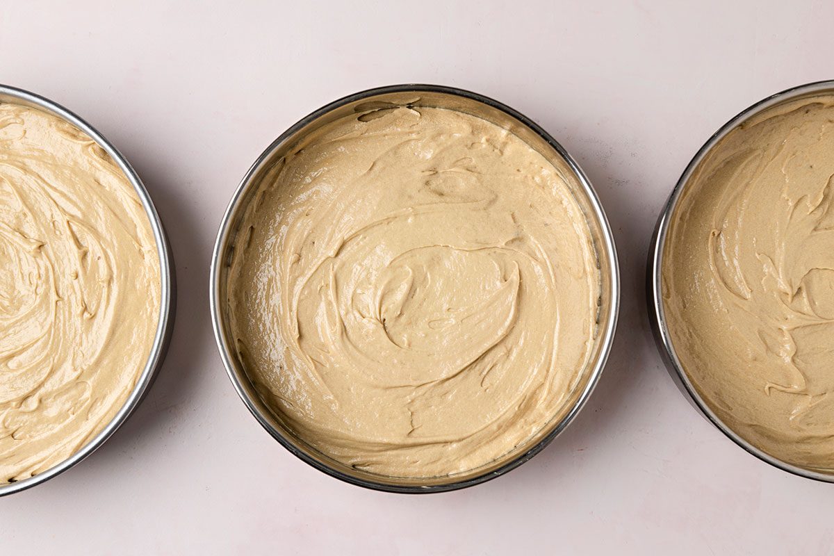 Batter among the three prepared pans.