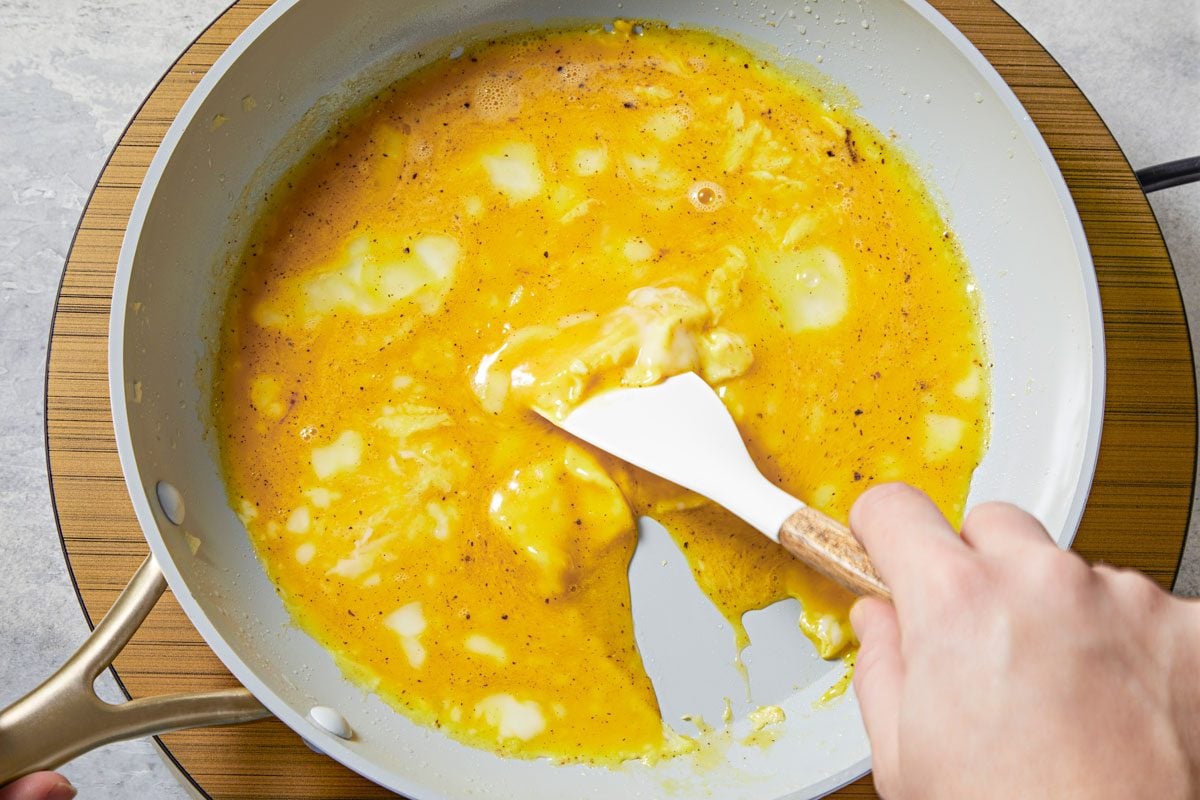 Transfer egg mixture to a pan.