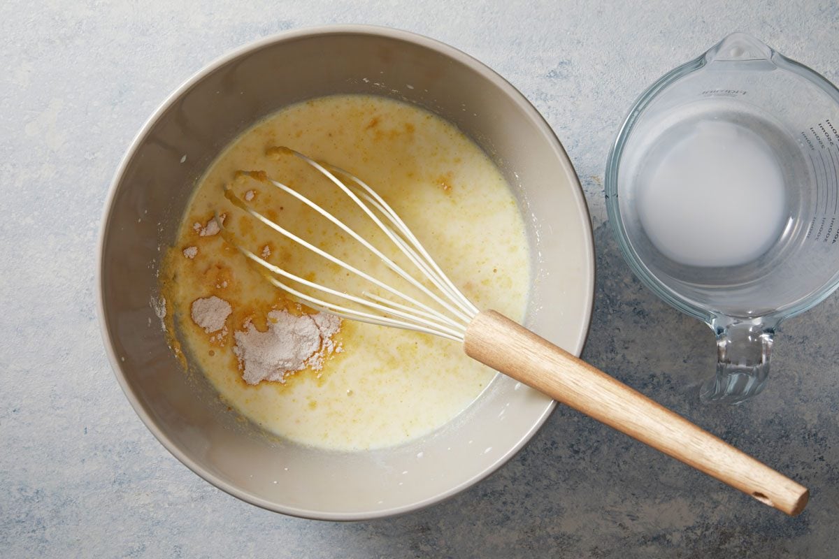 In a large bowl, whisk together milk and pudding mix