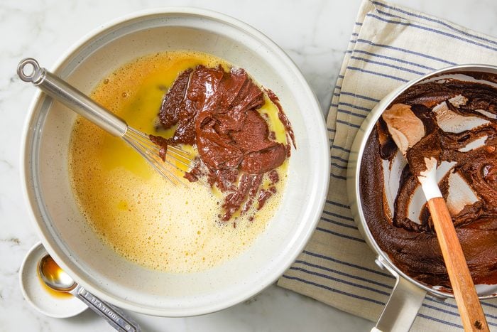 In a large bowl, whisk eggs until foamy, add chocolate mix