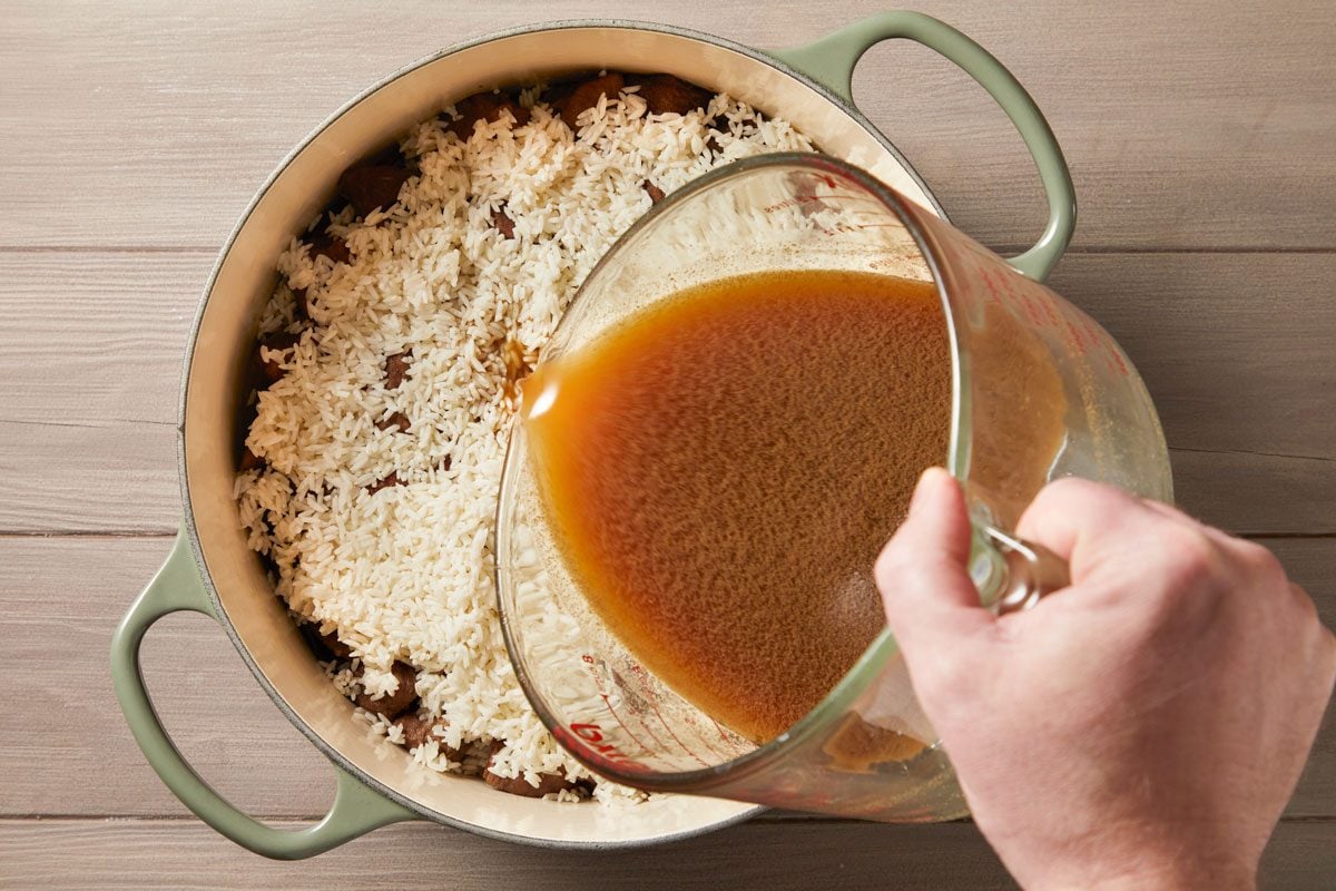 Pour reserved stock over rice