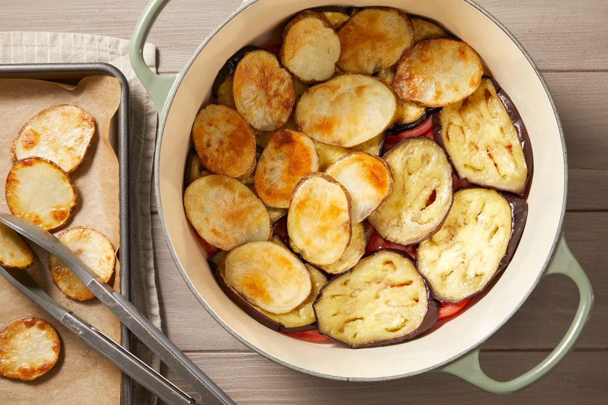 Top with roasted eggplant and potatoes,