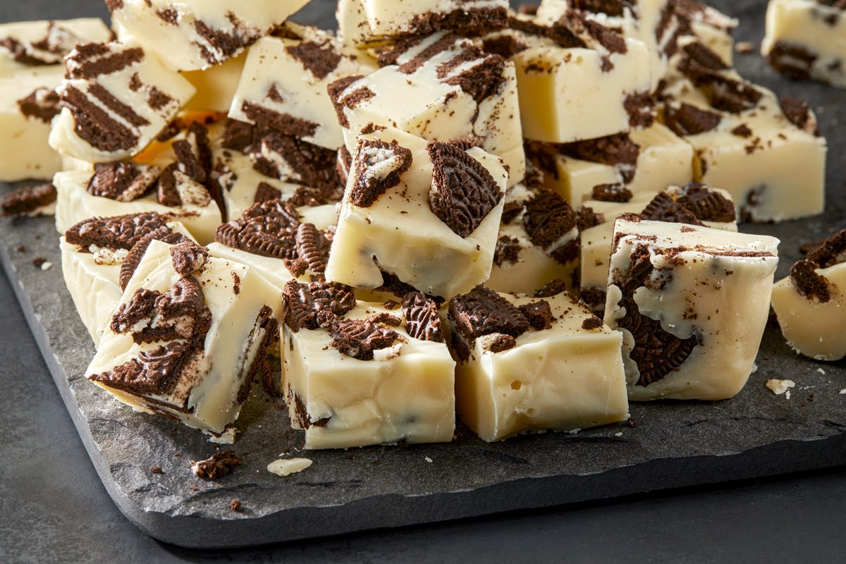 Rich and creamy Oreo Chocolate Fudge served on a dark slate surface