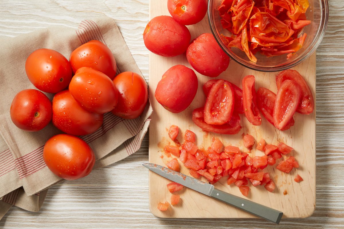 tomatoes being chopped