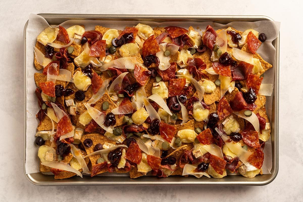 Charcuterie Nachos on a baking sheet