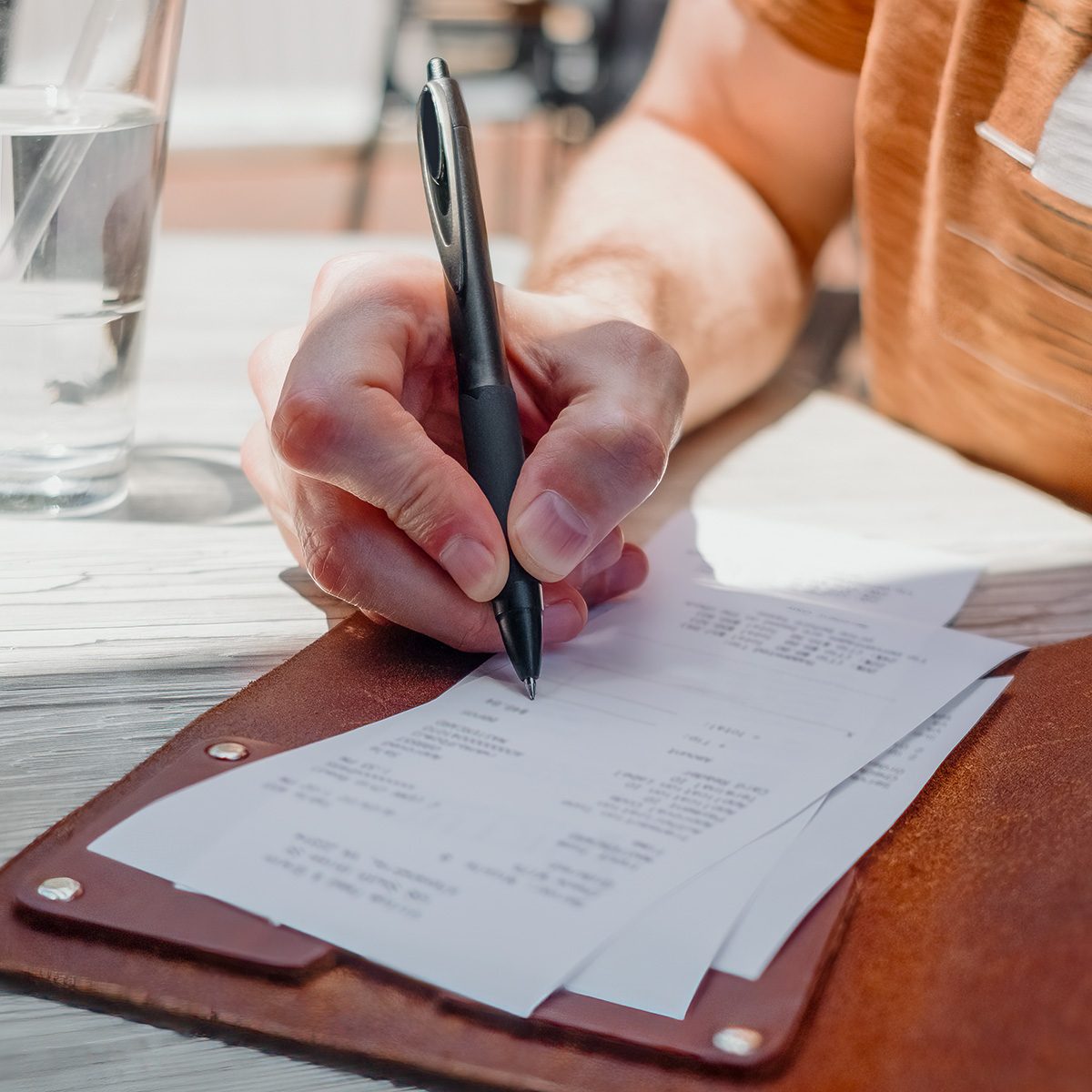 This Is the Only Way to Make Sure Restaurant Servers Actually Get Your Tips