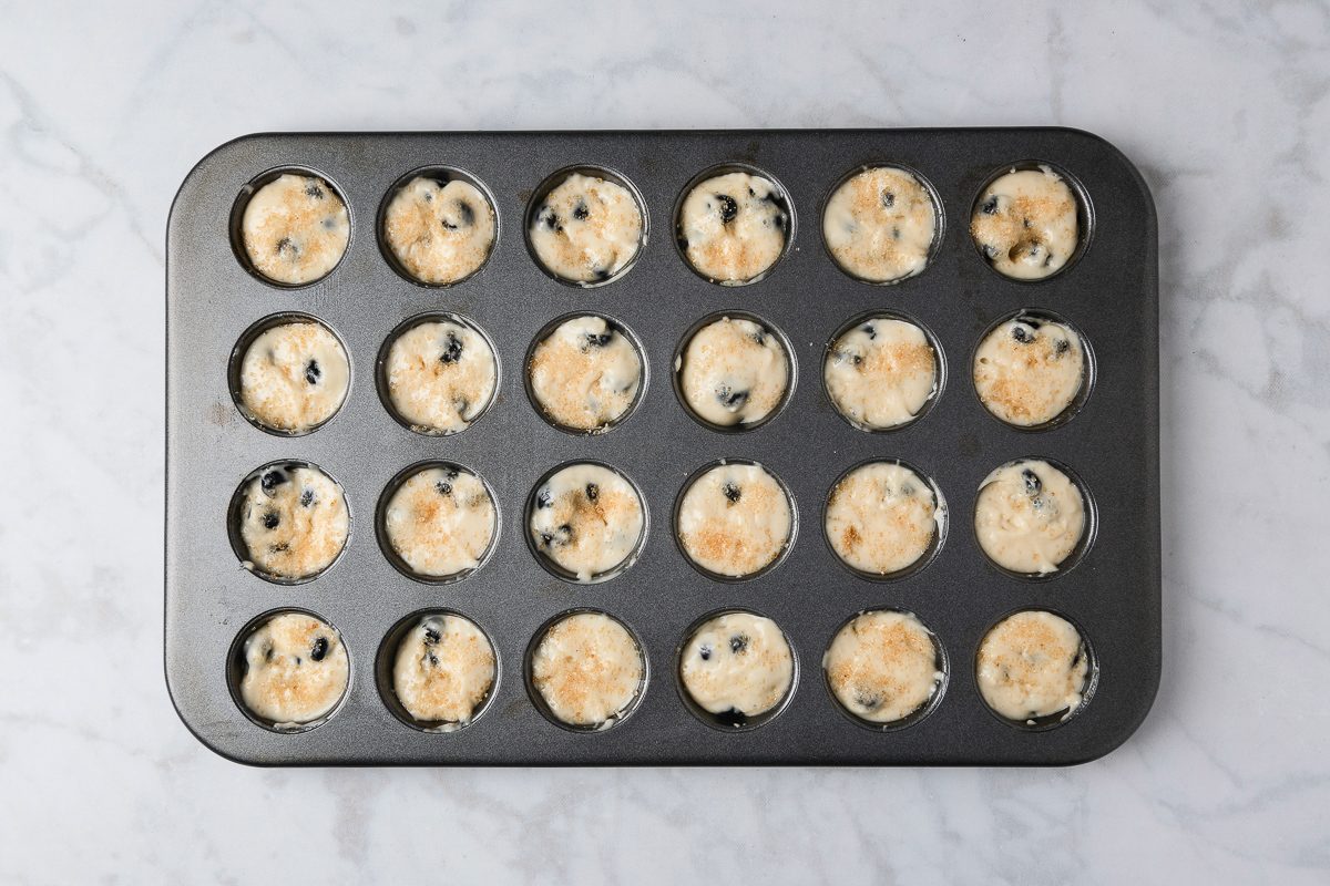 muffin tin filled with batter