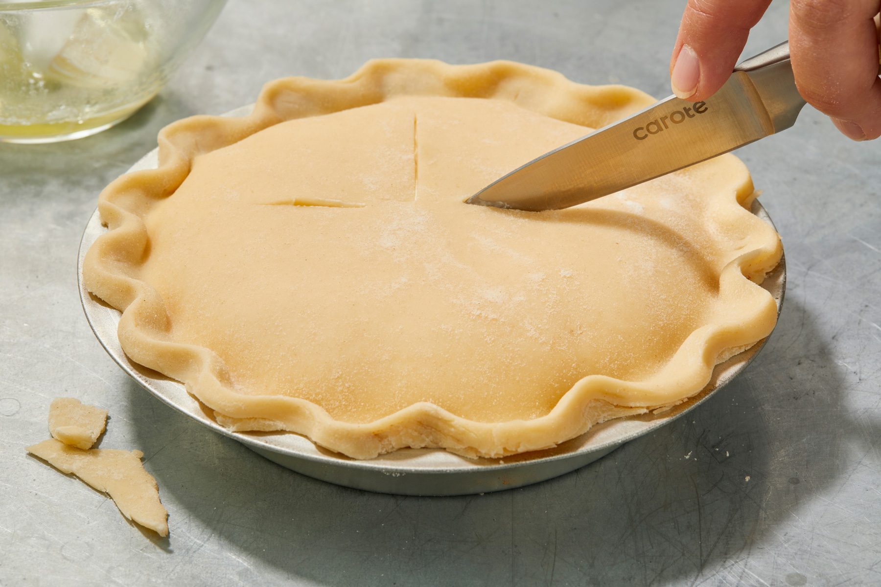 Roll out remaining pastry to fit top of pie; Place over filling; Trim seal and flute edges; Cut slits in pastry