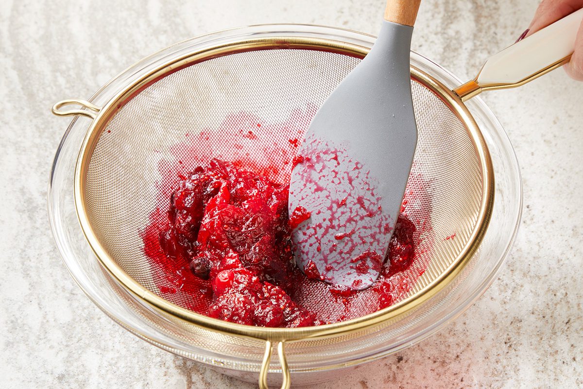 Press cranberry mixture through a fine sieve into a small bowl; discard pulp and seeds