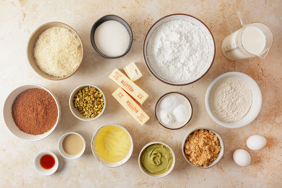 Dubai Chocolate Cake ingredients on a table in different bowls