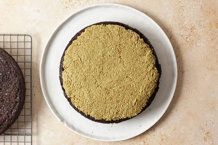 Dubai choclate cake being prepared, One layer added