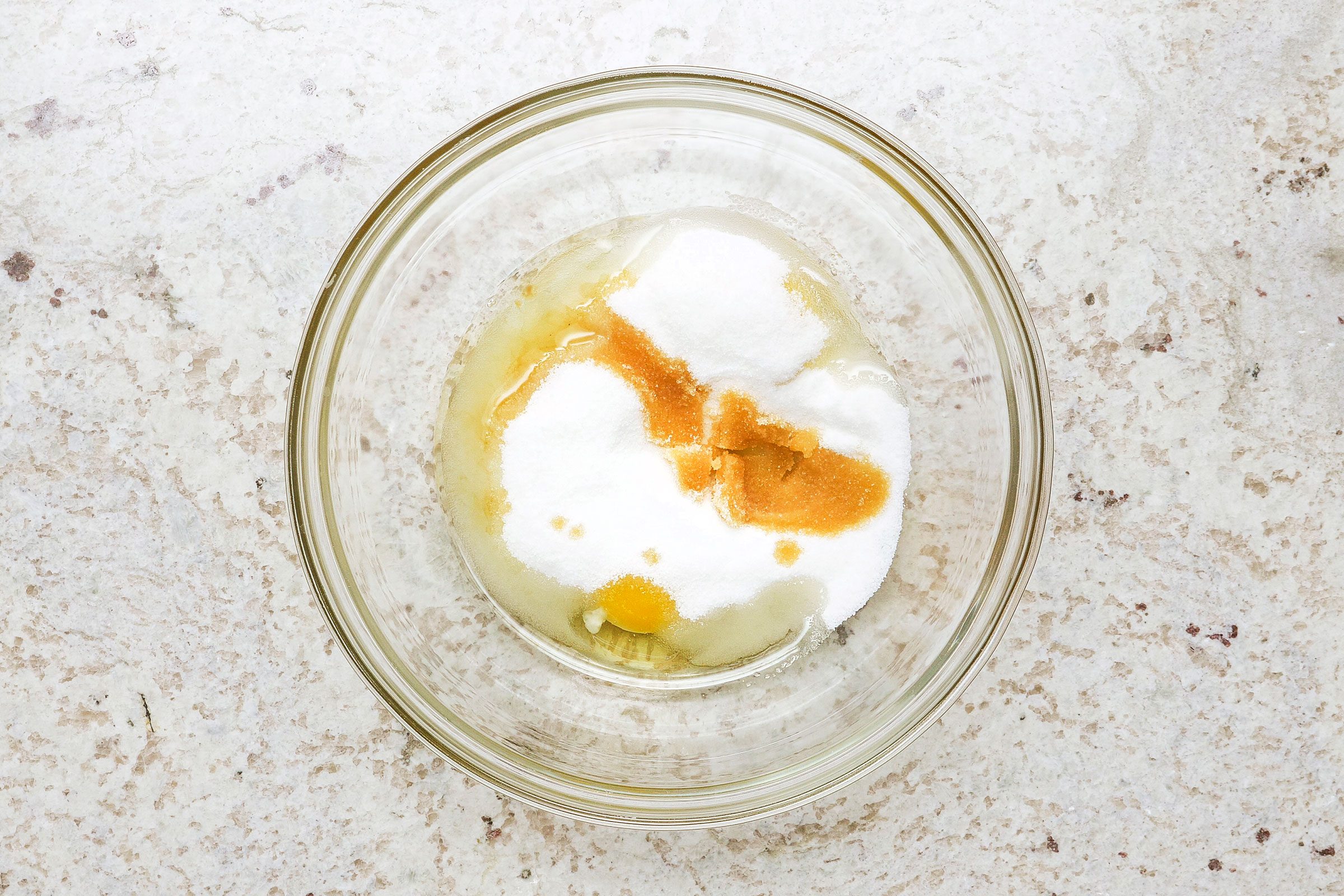 Beating eggs, sugar and vanilla extract in a large bowl until the mixture becomes thick and lemon-colored