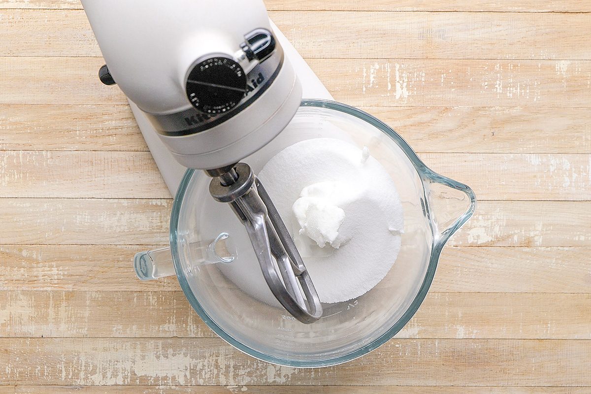 In a large bowl cream shortening and sugar until light and fluffy; Beat in eggs and vanilla