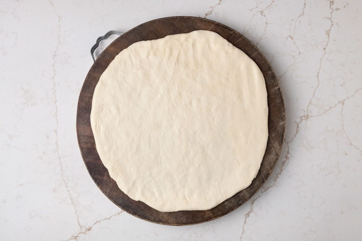 Punch dough down; Roll each into a 15 inch circle