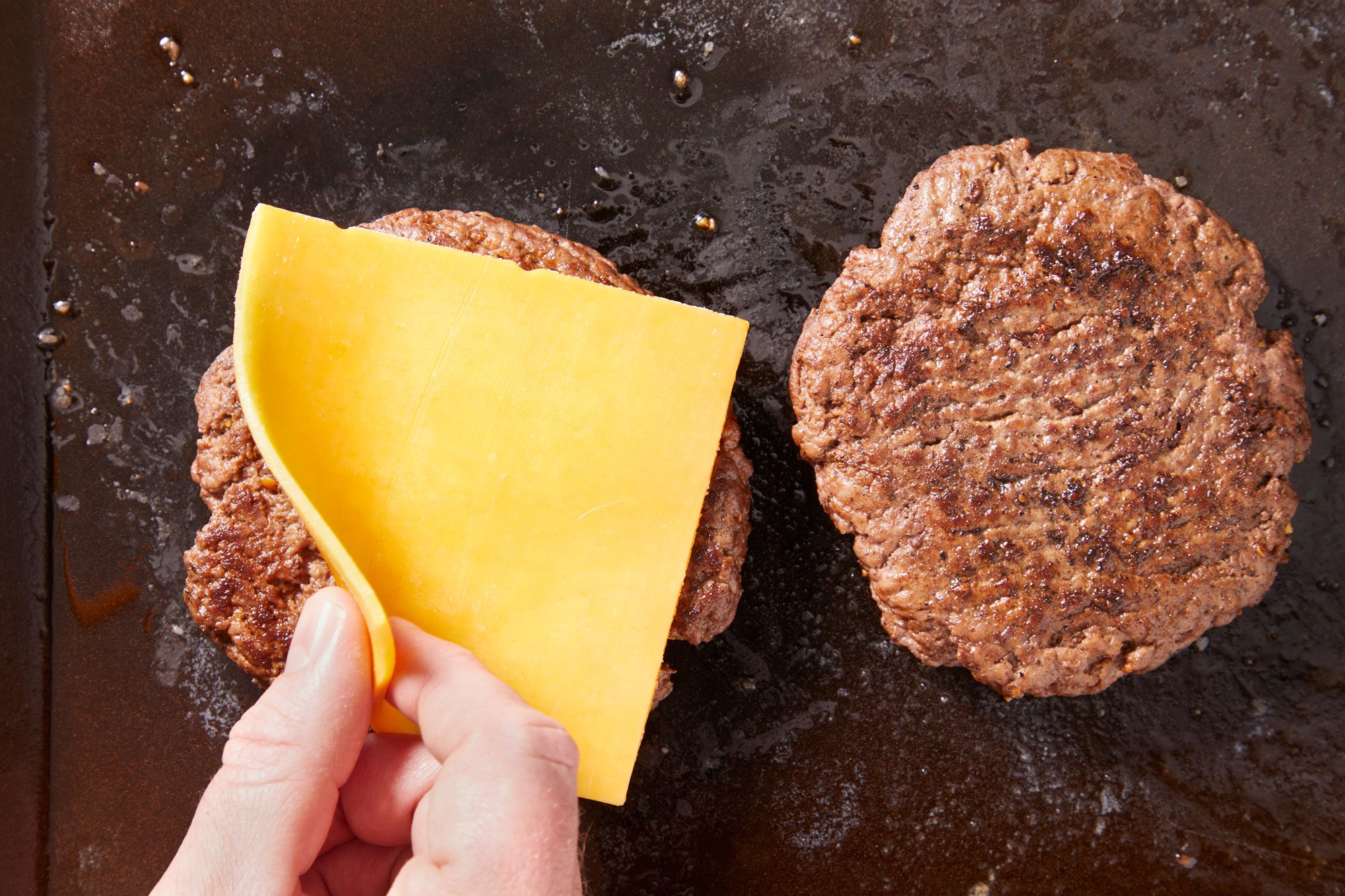 top with a slice of cheddar cheese