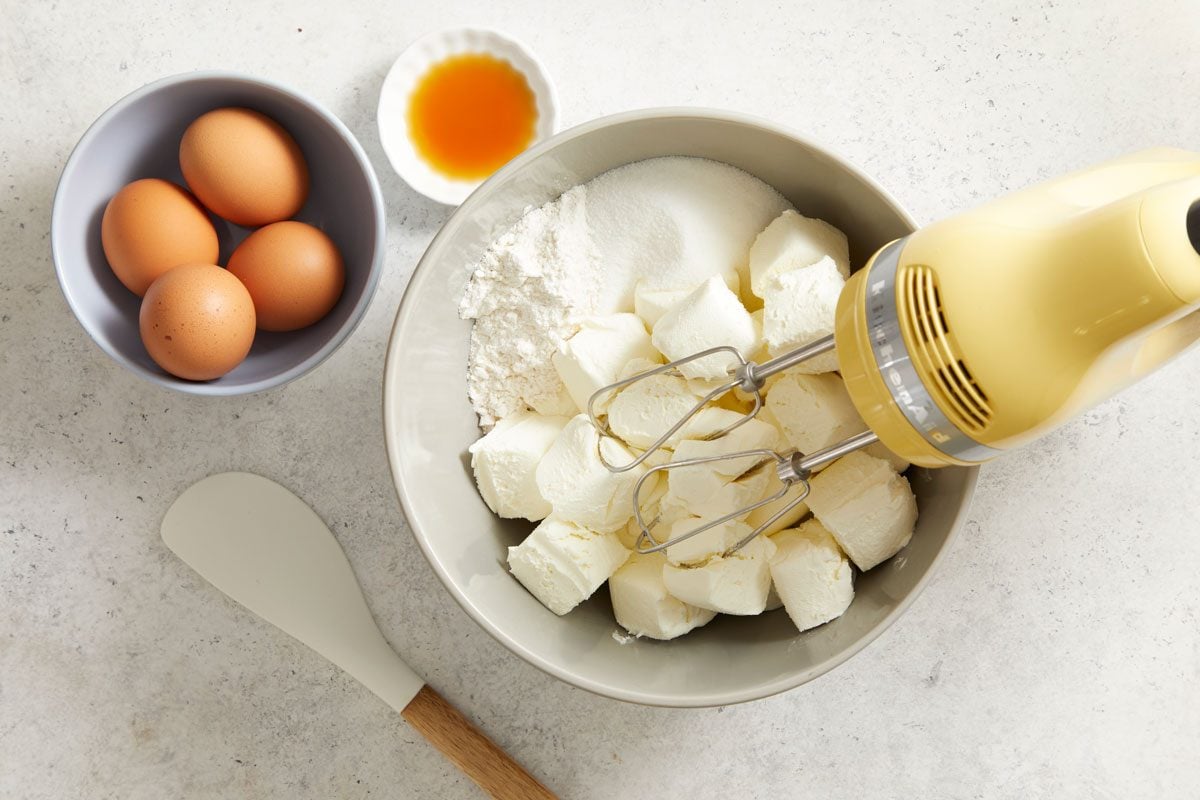 In a large bowl, beat the cream cheese, sugar, flour and vanilla until smooth. Add eggs; beat on low speed just until combined.
