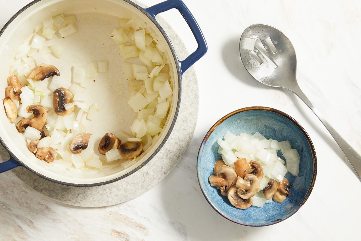 sautéed onions and mushrooms set aside in a small bowl