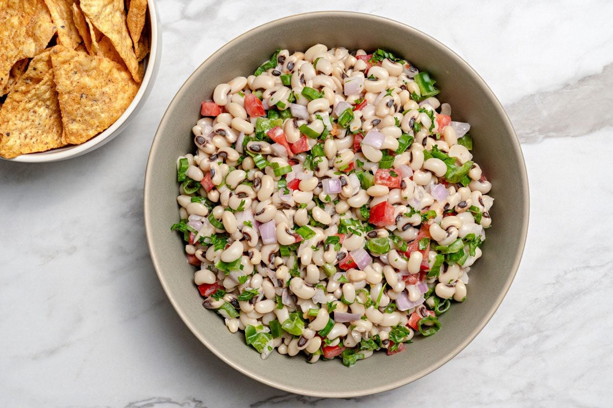 Overhead shot of Black-Eyed Pea Salsa served with nachos