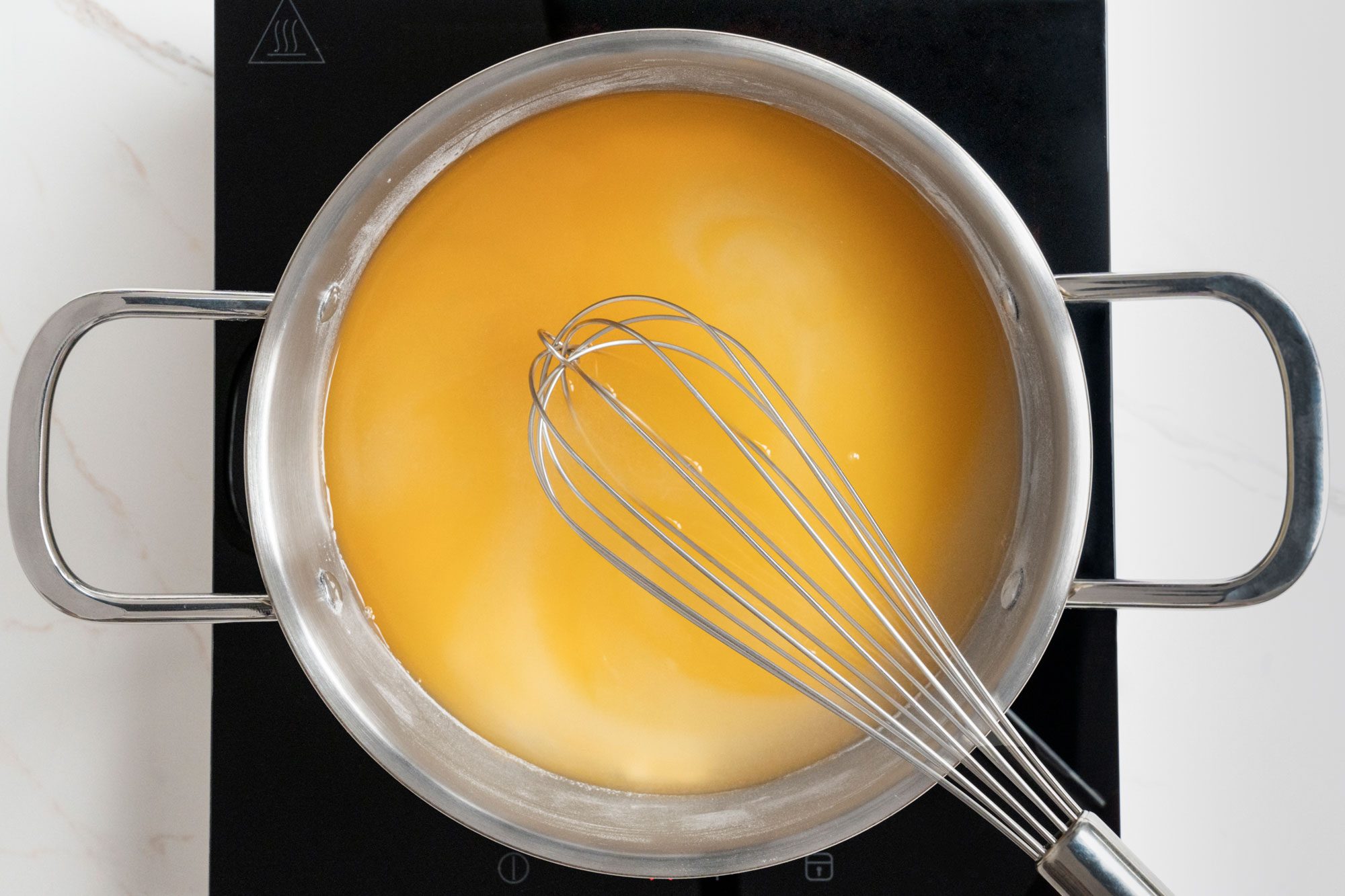 In a small saucepan, combine sugar and cornstarch; Add the orange juice, lemon juice and reserved pineapple juice
