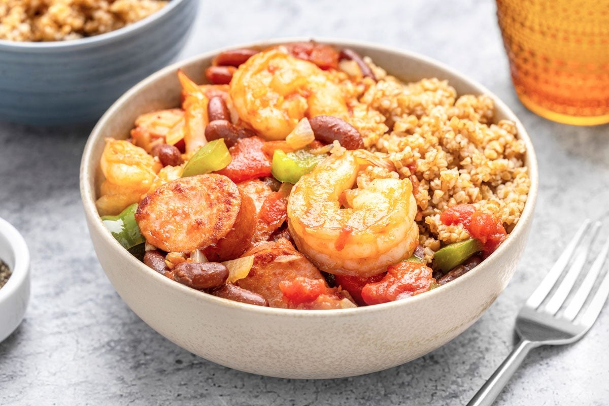 Creole Shrimp And Sausage is ready and served in a bowl