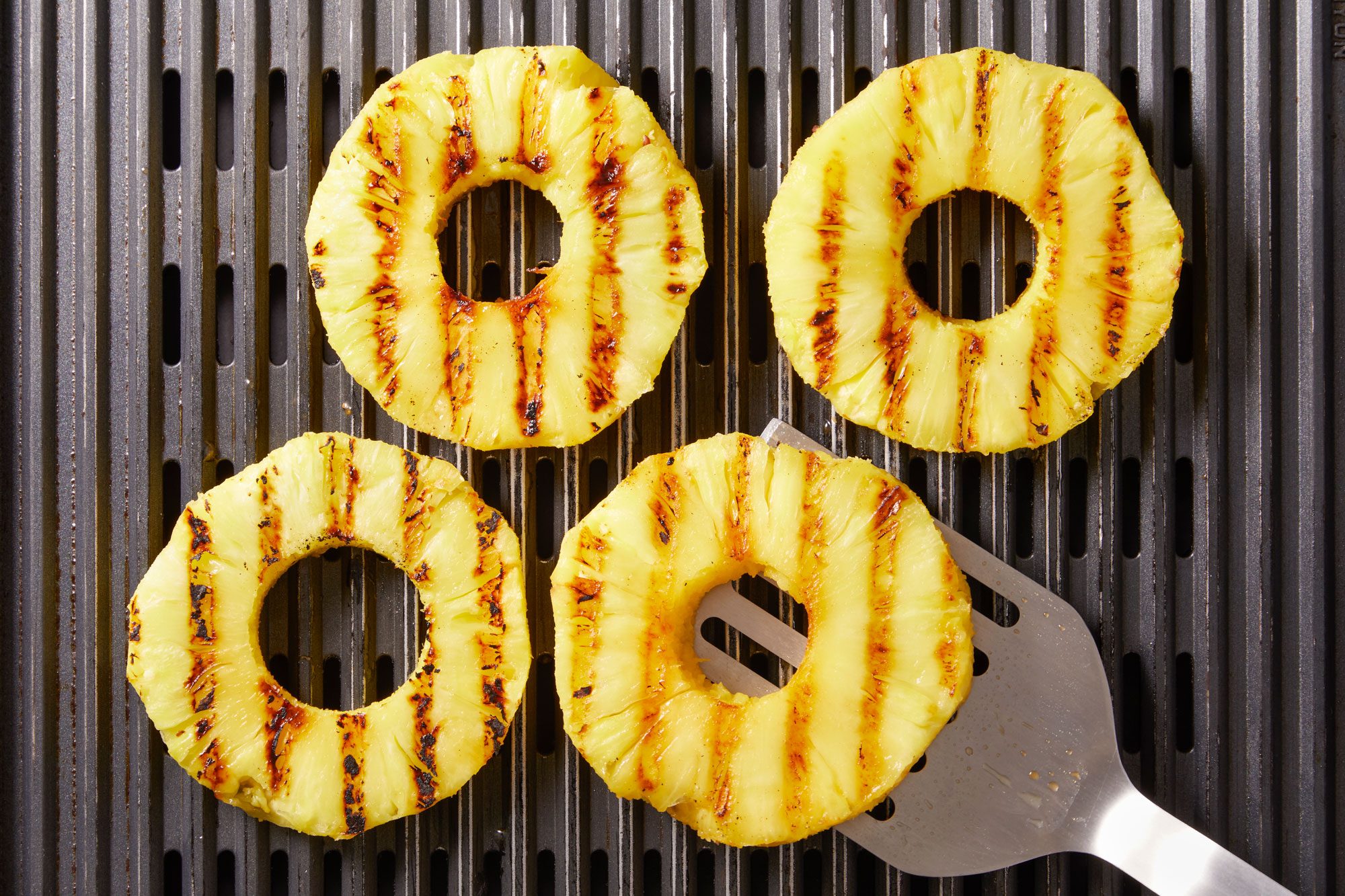 Grill pineapple slices, turning frequently,