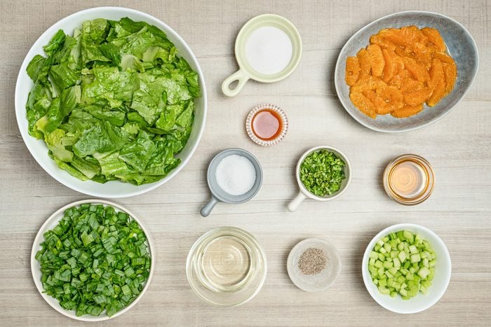 dressing, romaine, oranges, celery, green onions and parsley