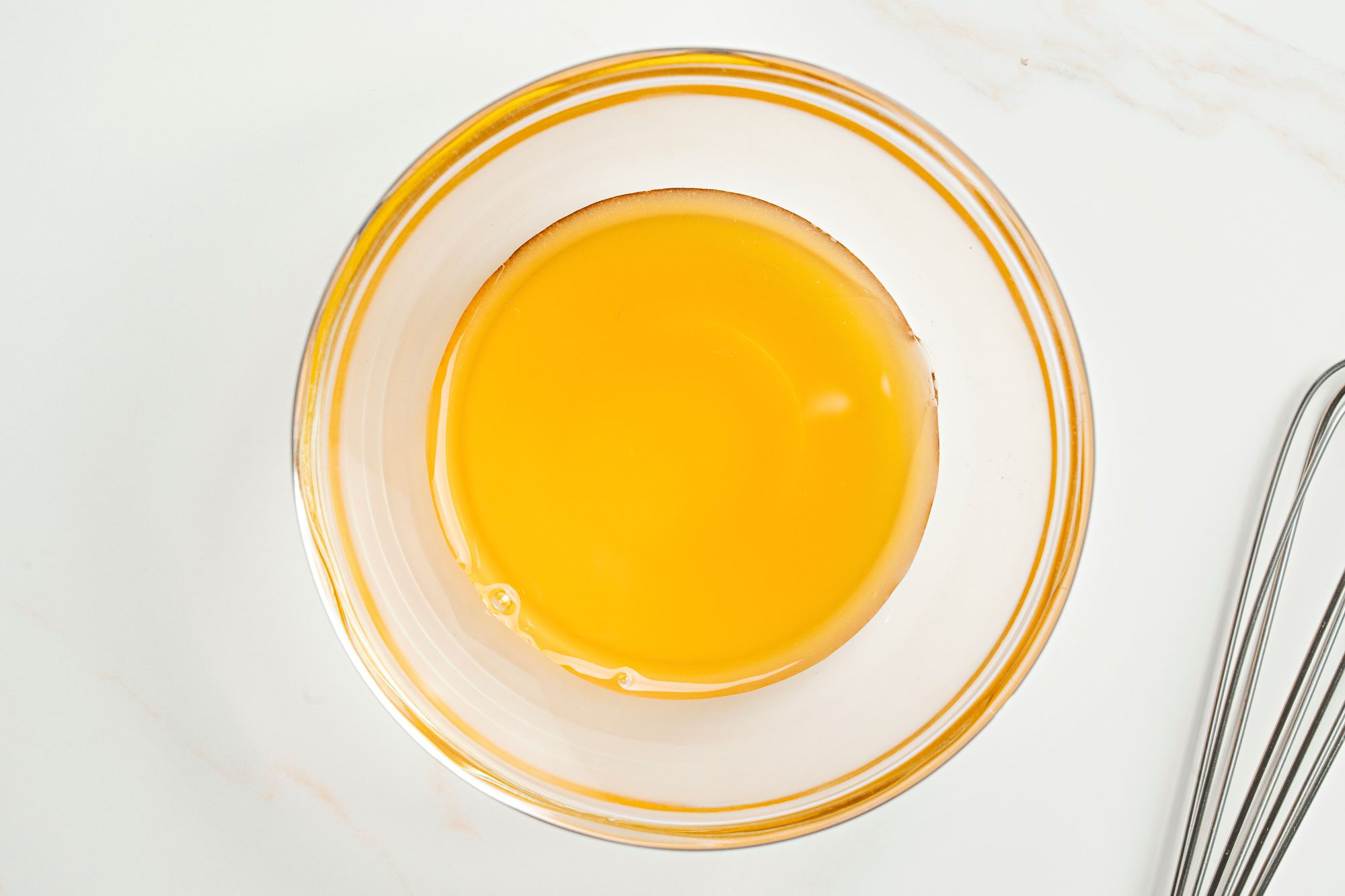 In a small bowl, mix honey and orange flower water