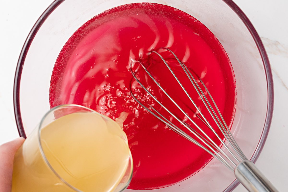 adding pineapple and lemon juice mixture