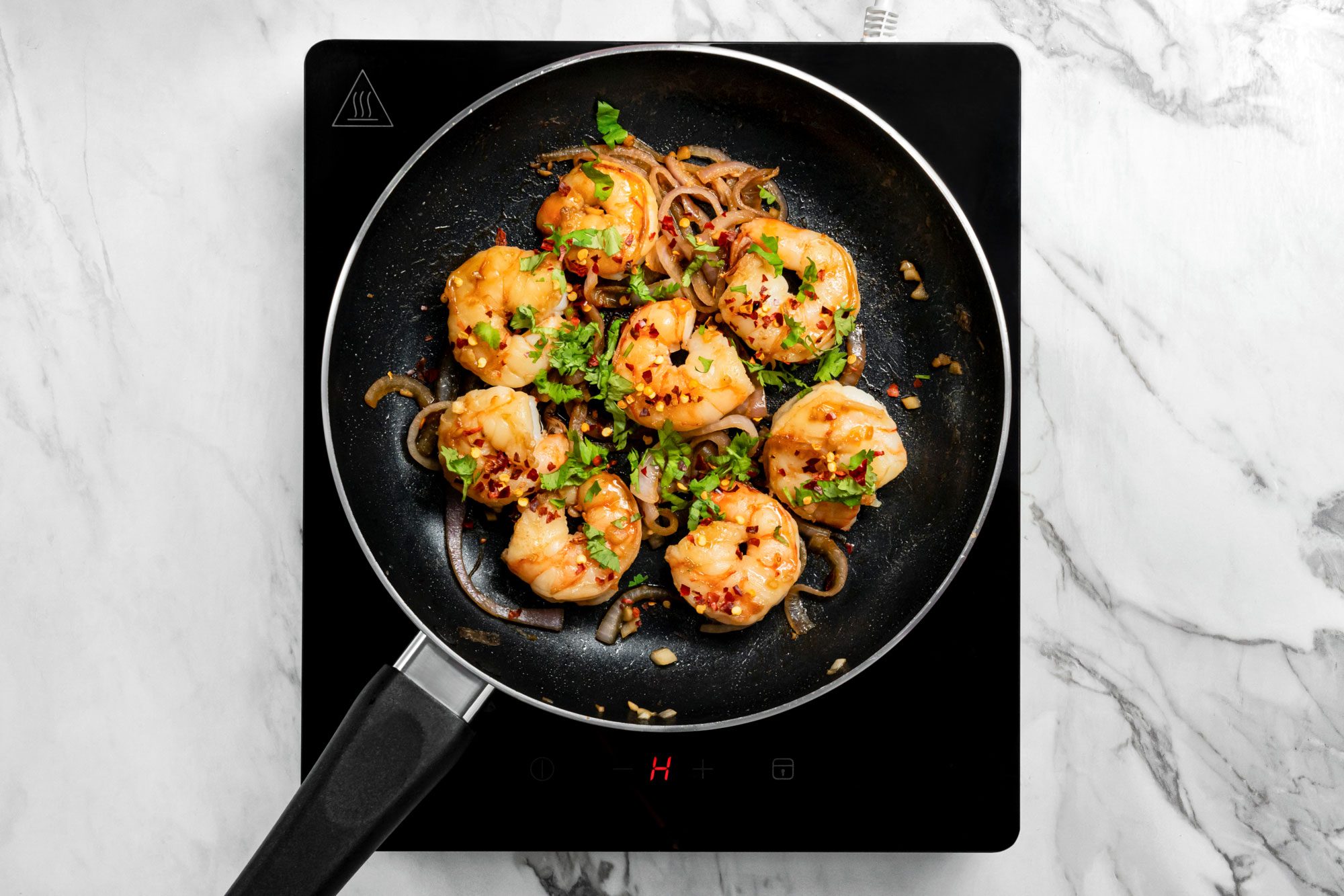 Stir in cilantro and pepper flakes