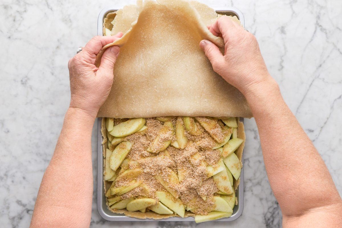 adding top crust of the pie