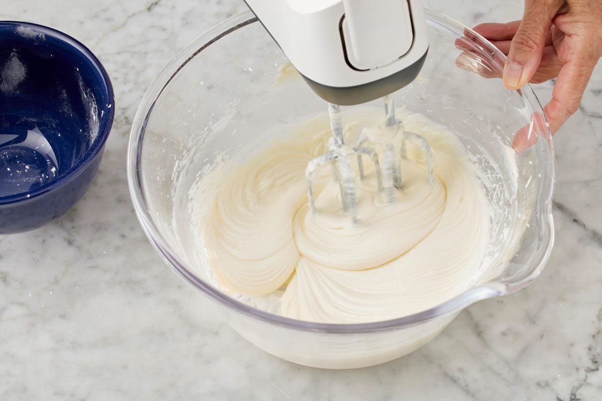 In a large bowl, beat cream cheese and sugar until creamy.